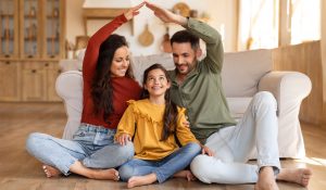 Smiling,Family,Creating,A,Heartwarming,Scene,By,Fashioning,A,House